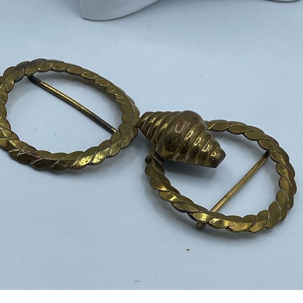 Two Vintage twisted brass belt buckles